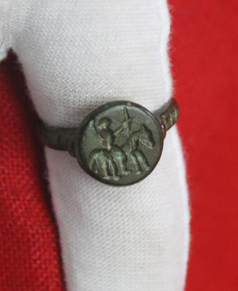 A Fabulous Knight’s Seal Ring, From Agincourt to the Wars of the Roses Period. A 15th Century Ring with an Intaglio Stylized Engraving of An Armoured Knight on Horseback Holding Aloft His Knightly Sword, a Fabulous and Beautiful Piece.