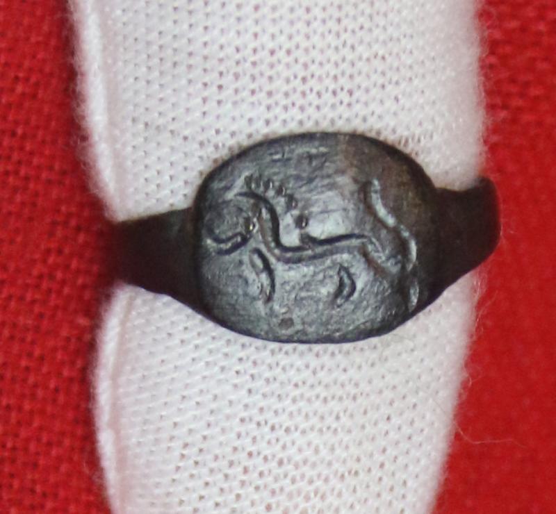 A Rare Original Roman Gladiatrix, {A Female Gladiator} Size Bronze Ring, Early Imperial Roman Period. Featuring A Coliseum Barbary Lion in a Combat Pose Around 1900 Years Old