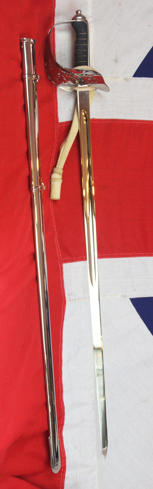 A Very Good Current Service 1897 Pattern ERII Post 1953 Officer's Sword In Nickel Plated Dress Scabbard, with Its Original Buff Hide Knot