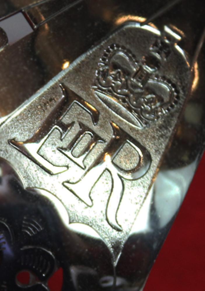 A Very Good Current Service 1897 Pattern ERII Post 1953 Officer's Sword In Nickel Plated Dress Scabbard, with Its Original Buff Hide Knot