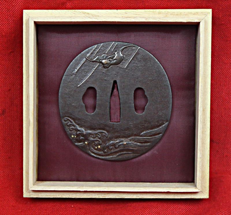 A Beautiful & Stunning Edo Period Tetsu Round Tsuba Of a Bat Flying in Rain Over Turbulant Seas.