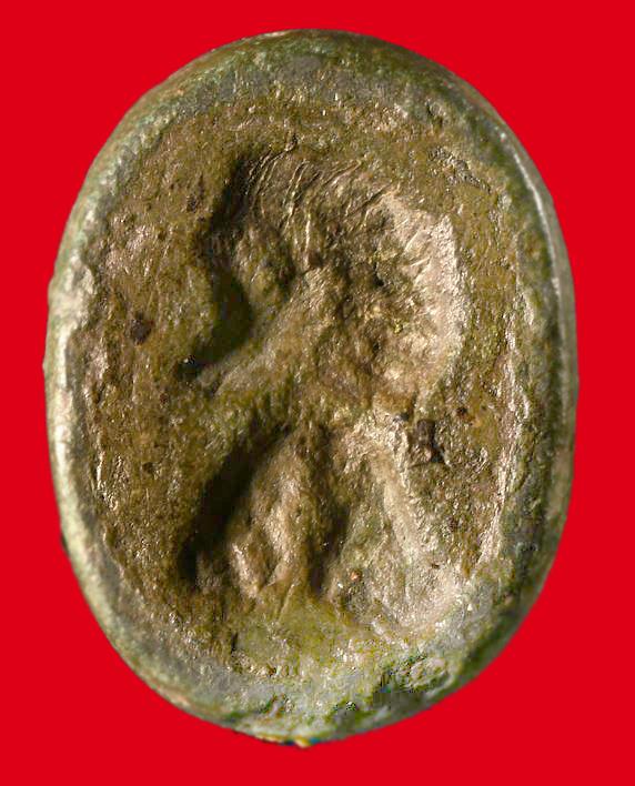 1st 2nd Century Romano British Ellipsoid Glass Ring Mount Depicting the Impressed Head of the Sky God of Thunder Taranis {Roman,Jupiter} or Mithras {Roman, Mars} Of the East of England Mithraic Cult. From the Era of 'King' Caratacus