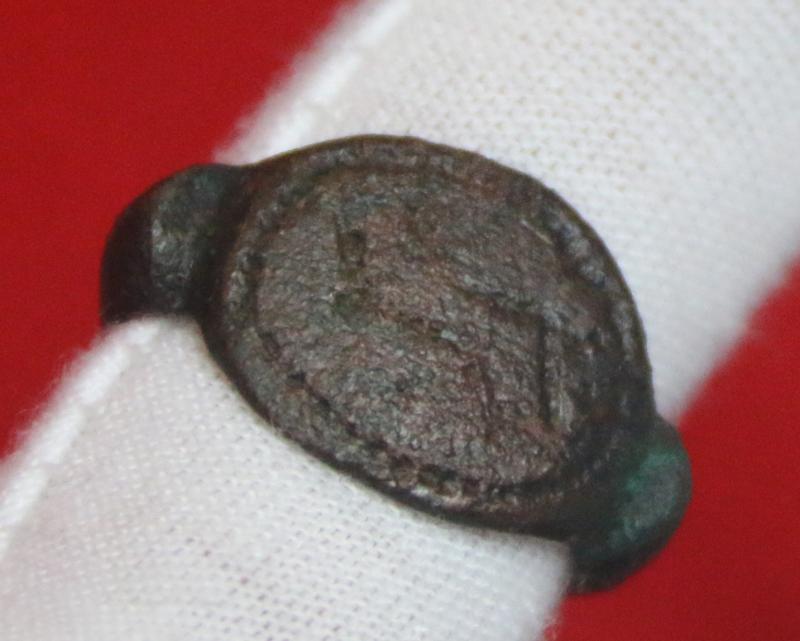 A Stunning Ancient Roman Ist Century AD, Galloping Cavalry Soldier on Horseback, Stylized Intaglio Engraved Bronze 'Status' Seal Ring.