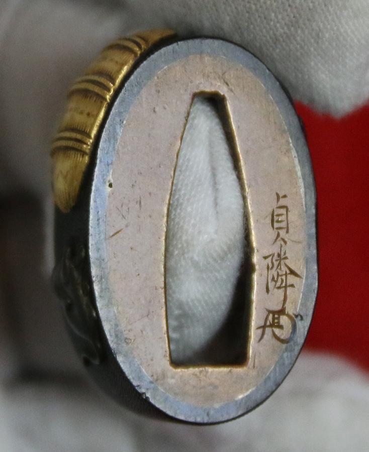 A Stunning Quality Edo Period Tanto Fuchi In Shakudo and Pure Gold. Incredible Fine Quality Chisselled Takebori Carving of Rats Around a Gold Koku Traditional Rice Bale. Signed with Kikihan