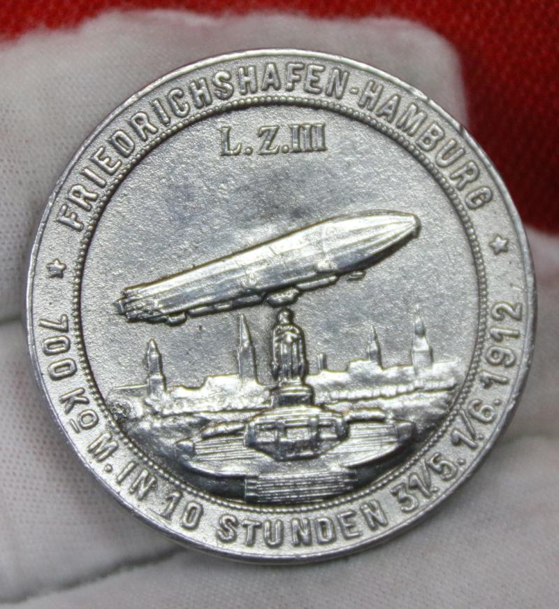 A Rare Aeronautical Medal, Dated 1912, Of The Zeppelin Z3 {AKA LZ12}, Count von Zeppelin Friedrichshafen to Hamburg Flight. Showing The Flight Over The Bismark Memorial