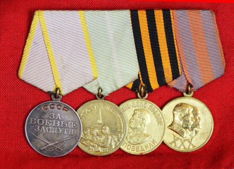 Original Four Medal Group Soviet WW2 Combat Veteran. Medal for Combat Merit, Medal for Victory Over Germany in the Great Patriotic War of 1941-45, USSR Leningrad Medal of 1942, Medal for 30 Years of the Soviet Army and Navy 1948