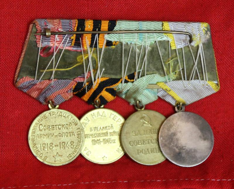 Original Four Medal Group Soviet WW2 Combat Veteran. Medal for Combat Merit, Medal for Victory Over Germany in the Great Patriotic War of 1941-45, USSR Leningrad Medal of 1942, Medal for 30 Years of the Soviet Army and Navy 1948