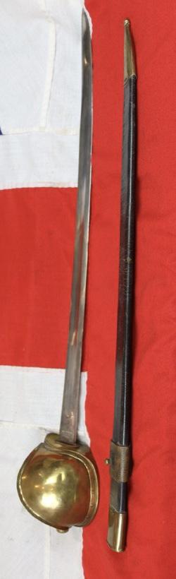 A Large Half Bowl Brass Hilted Cutlass With Steel Single Edged Blade. Wide Single Blade Fuller, No Maker Markings.