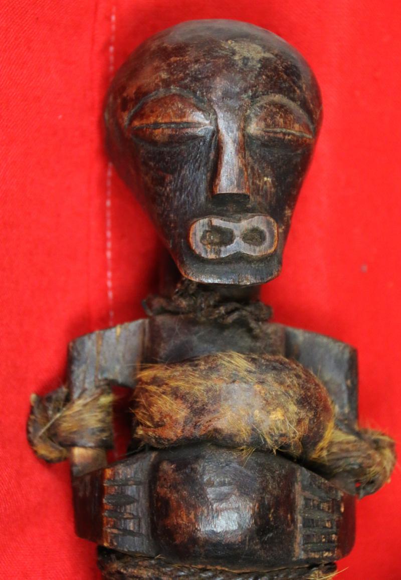 An Original Congolese Songye Fetish Female 'Power Figure'. A Most Beautiful and Perfect Example Of The Combination of Esoteric, Spiritually Symbolic & Cultural African Tribal Art From The Last Century. Late 19th to Early 20th Century.