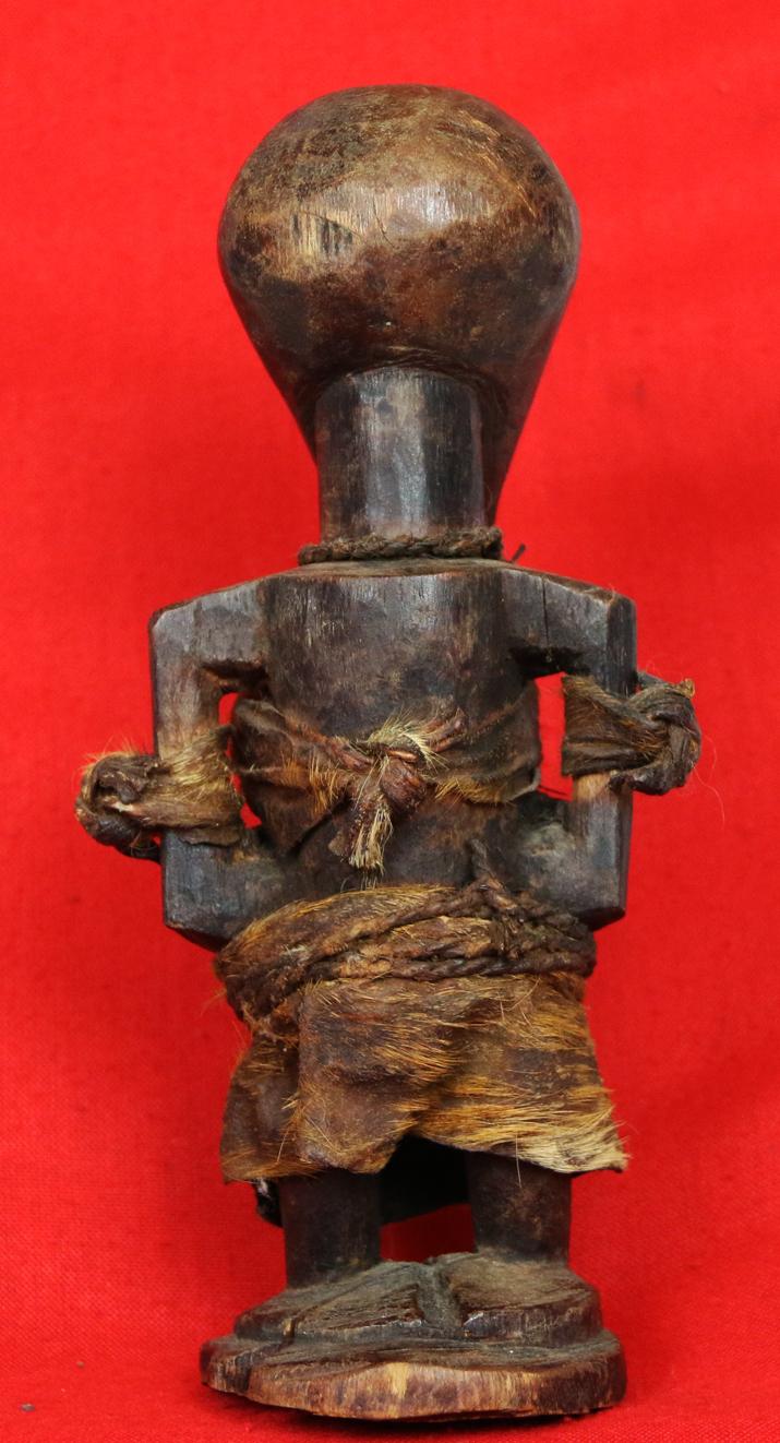 An Original Congolese Songye Fetish Female 'Power Figure'. A Most Beautiful and Perfect Example Of The Combination of Esoteric, Spiritually Symbolic & Cultural African Tribal Art From The Last Century. Late 19th to Early 20th Century.