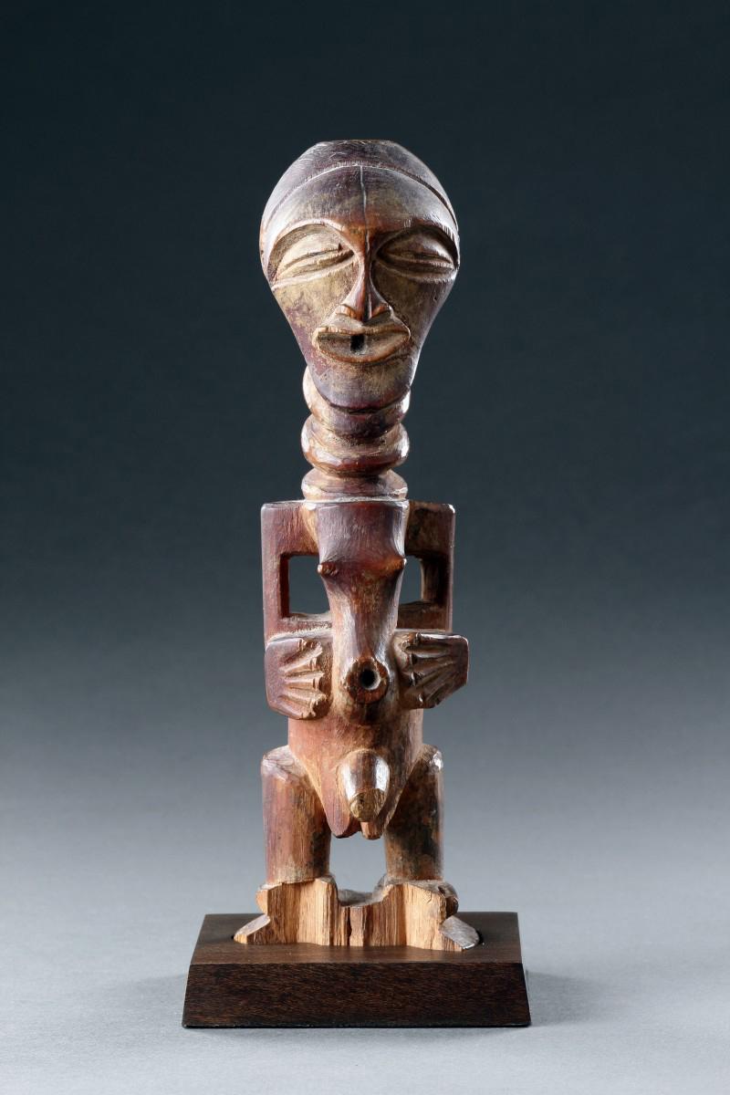 An Original Congolese Songye Fetish Female 'Power Figure'. A Most Beautiful and Perfect Example Of The Combination of Esoteric, Spiritually Symbolic & Cultural African Tribal Art From The Last Century. Late 19th to Early 20th Century.