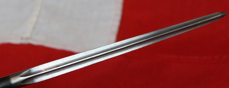 Very Rare & The Most Collectable Bayonet of WW2. A WWII British Lee Enfield No 4 MK 1 Cruciform Spike Bayonet By ‘SM’ (Singer Manufacturing Co) With MK 1 Scabbard. The Earliest, & Briefly Issued Bayonet Of The No4 Rifle in WW2