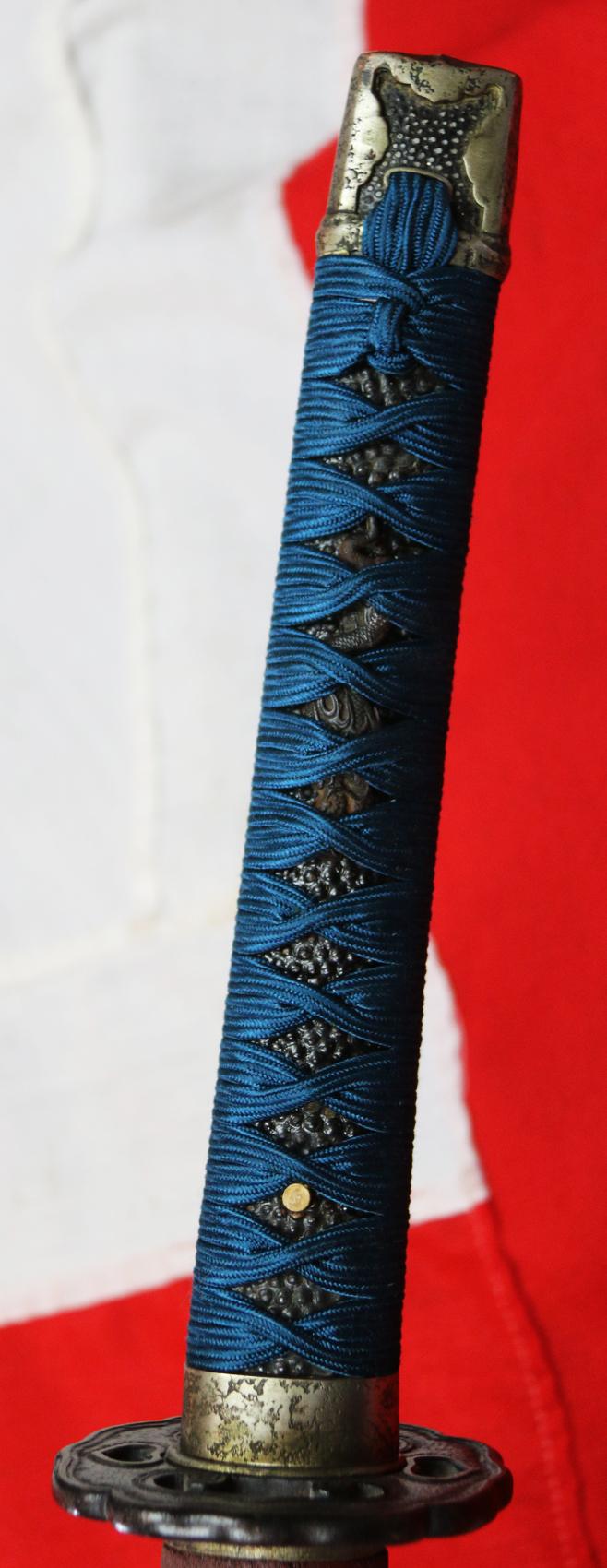 An Ancient Koto Period Samurai Sword, Almost 600 Years old, From The Sengoku Jidai. A Handachi Mounted Katana, With Beautiful Deep Red Ishime Urushi Lacquer Saya, Contrasted With Spectacular Green-Blue Silk Tsuka-ito, Set With Hammered Silver Onlaid Mount