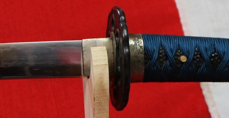 An Ancient Koto Period Samurai Sword, Almost 600 Years old, From The Sengoku Jidai. A Handachi Mounted Katana, With Beautiful Deep Red Ishime Urushi Lacquer Saya, Contrasted With Spectacular Green-Blue Silk Tsuka-ito, Set With Hammered Silver Onlaid Mount
