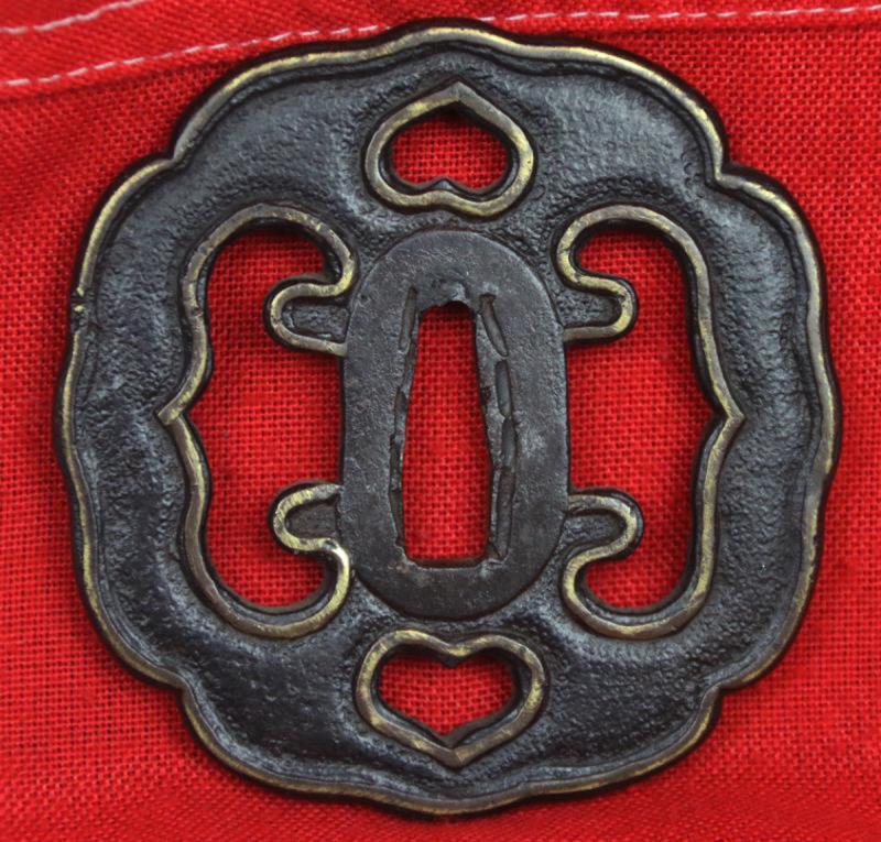 An Ancient Koto Period Samurai Sword, Almost 600 Years old, From The Sengoku Jidai. A Handachi Mounted Katana, With Beautiful Deep Red Ishime Urushi Lacquer Saya, Contrasted With Spectacular Green-Blue Silk Tsuka-ito, Set With Hammered Silver Onlaid Mount