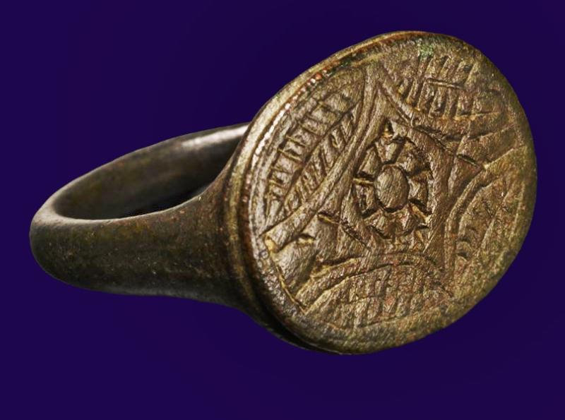 A Captivating, Plantagenet, War Of The Roses Era Bronze Ring, Circa 1455, With A Central Engraved Yorkist or Lancastrian Rose Surrounded By Four Rose Leaves. Likely Worn By A Plantagenet, Aide, or Supporter.