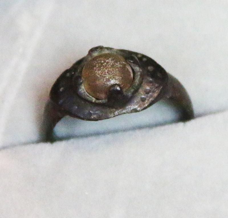 A Wonderful, Around 1200 Year Old Original Viking Bronze Ring, Four Claw Bezel Setting With Its Original Amber Glass Cabochon Gem. Punched Dot Decor Around The Ovoid Surround Of The Claw Setting