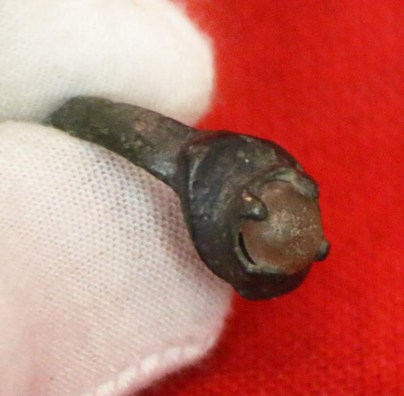 A Wonderful, Around 1200 Year Old Original Viking Bronze Ring, Four Claw Bezel Setting With Its Original Amber Glass Cabochon Gem. Punched Dot Decor Around The Ovoid Surround Of The Claw Setting