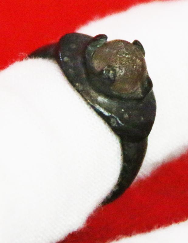 A Wonderful, Around 1200 Year Old Original Viking Bronze Ring, Four Claw Bezel Setting With Its Original Amber Glass Cabochon Gem. Punched Dot Decor Around The Ovoid Surround Of The Claw Setting