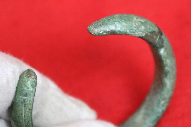 A Most Attractive, Serpent, Bronze Age Power Bracelet, Armilla, & Arm Ring. A Fabulous 1000 B.C. Arm Adornment, With Most Beautiful Natural Aged Patination Colour of Rich Emerald Green, In Superb Condition With Substantial Heft & Gravitas
