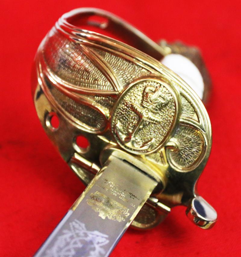 A ERII Royal Naval Officers Sword & Scabbard. Queen Elizabeth Cypher Blade & Traditional Queen's Crown Fouled Anchor Naval Pattern Hilt