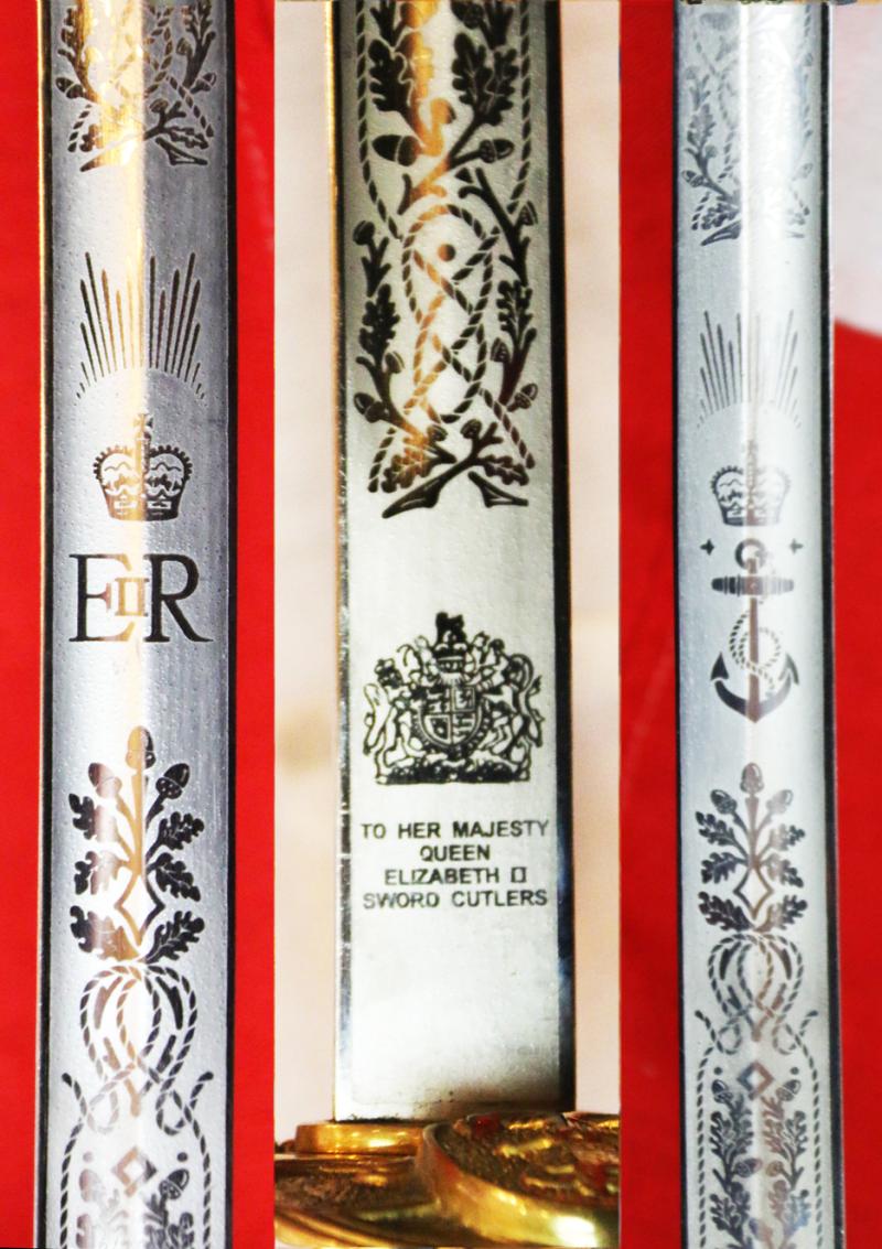 A ERII Royal Naval Officers Sword & Scabbard. Queen Elizabeth Cypher Blade & Traditional Queen's Crown Fouled Anchor Naval Pattern Hilt
