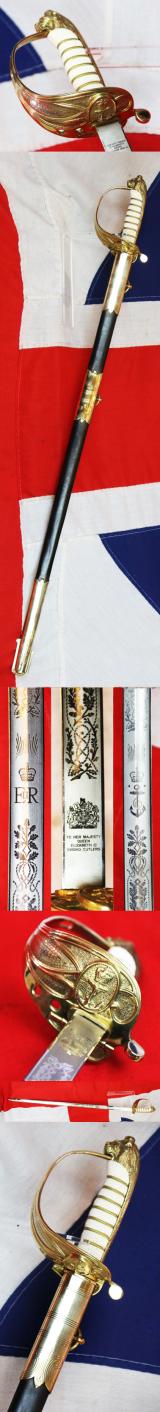 A ERII Royal Naval Officers Sword & Scabbard. Queen Elizabeth Cypher Blade & Traditional Queen's Crown Fouled Anchor Naval Pattern Hilt