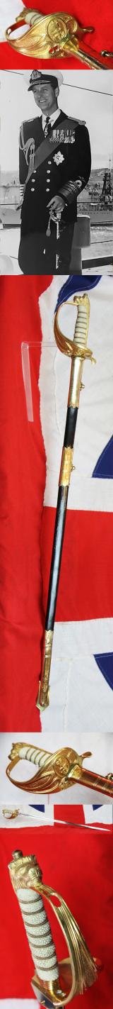 A Good 1950's Early ERII Royal Naval Officer's Sword & Scabbard. Queen Elizabeth Cypher Blade & Traditional Queen's Crown Fouled Anchor Naval Pattern Hilt
